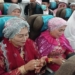 Unik! Jemaah Haji Suku Bugis Kenakan Baju Kurung Bak Ratu Saat Pulang ke Tanah Air